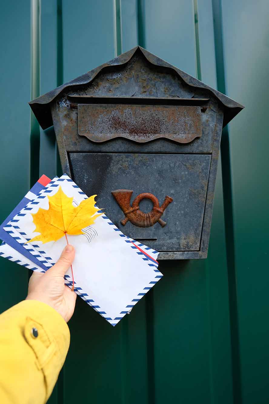 Delivering letters on postbox